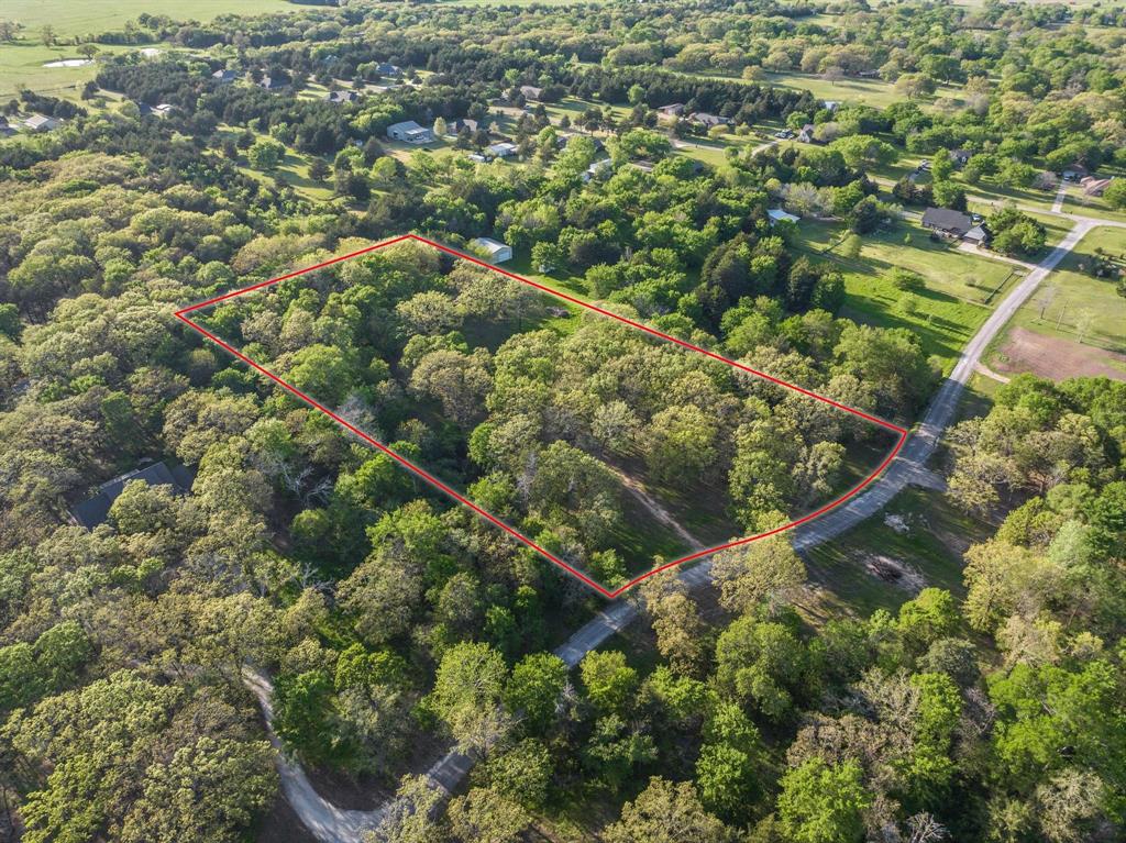 264 County Road 1452 Bonham, TX 75418 - Photo 21 of 32 an aerial view of residential houses with outdoor space