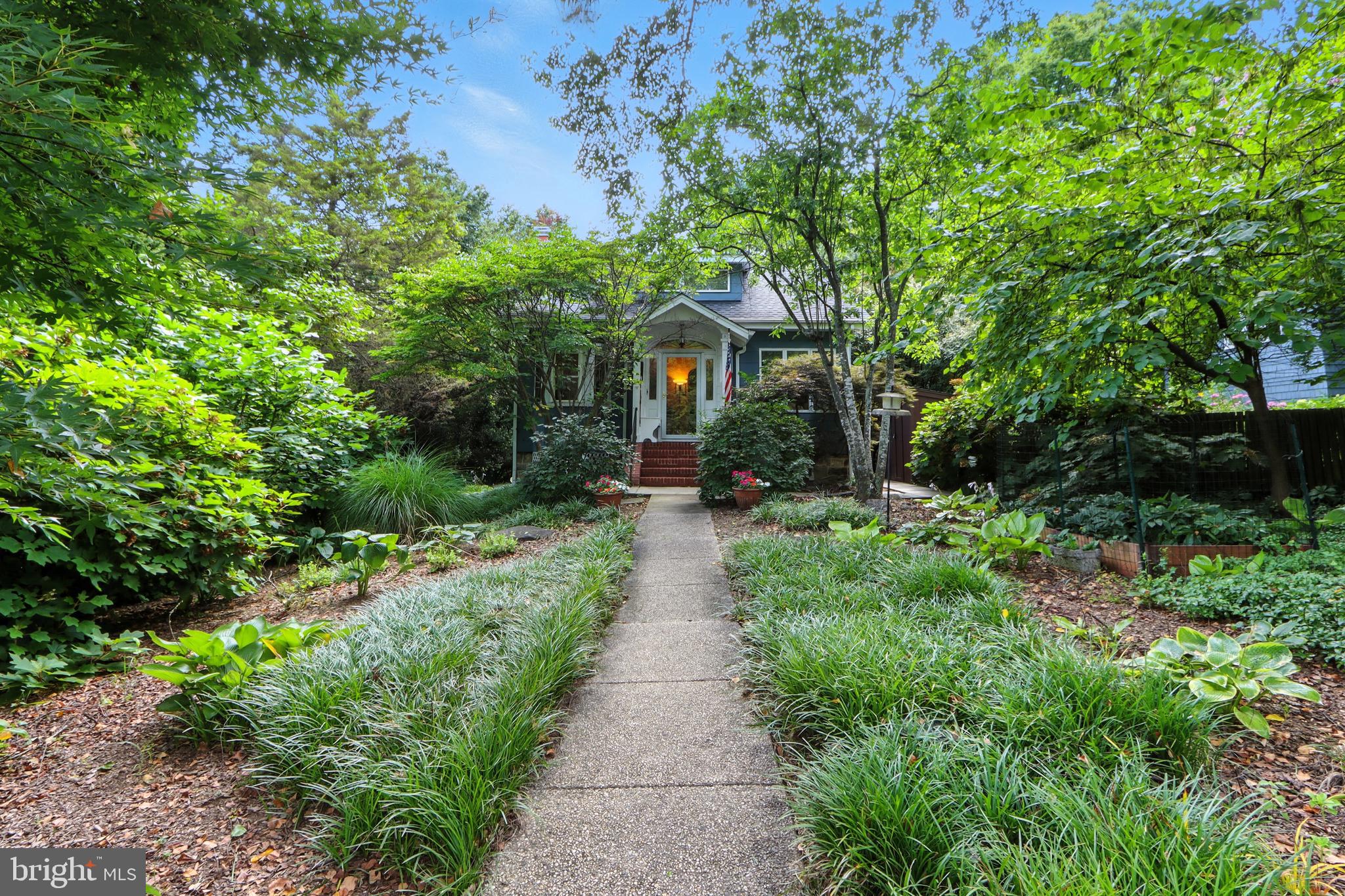 5721 Ridgedale Road Baltimore, MD 21209 - Photo 2 of 54 a view of a pathway with a garden