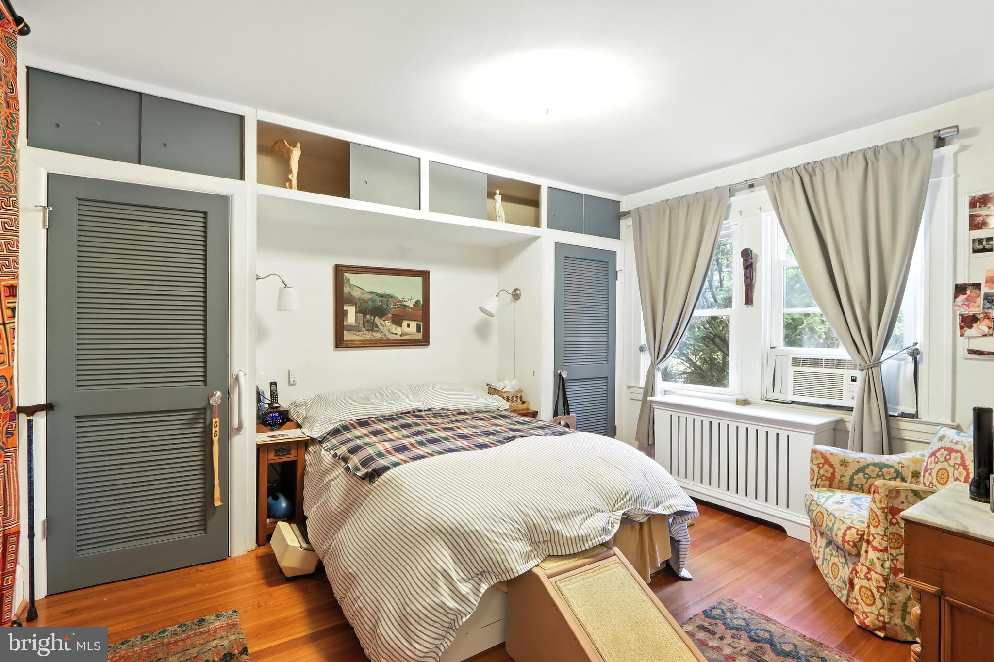 5721 Ridgedale Road Baltimore, MD 21209 - Photo 27 of 54 a bedroom with a bed and a window