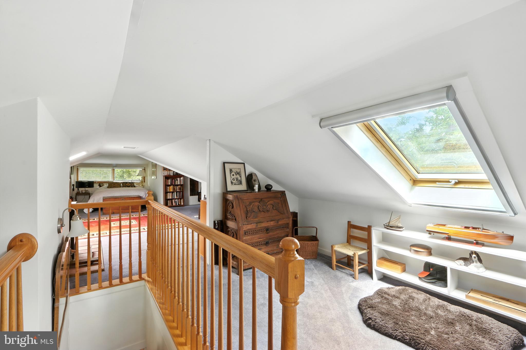 5721 Ridgedale Road Baltimore, MD 21209 - Photo 34 of 54 a bedroom with furniture and a window