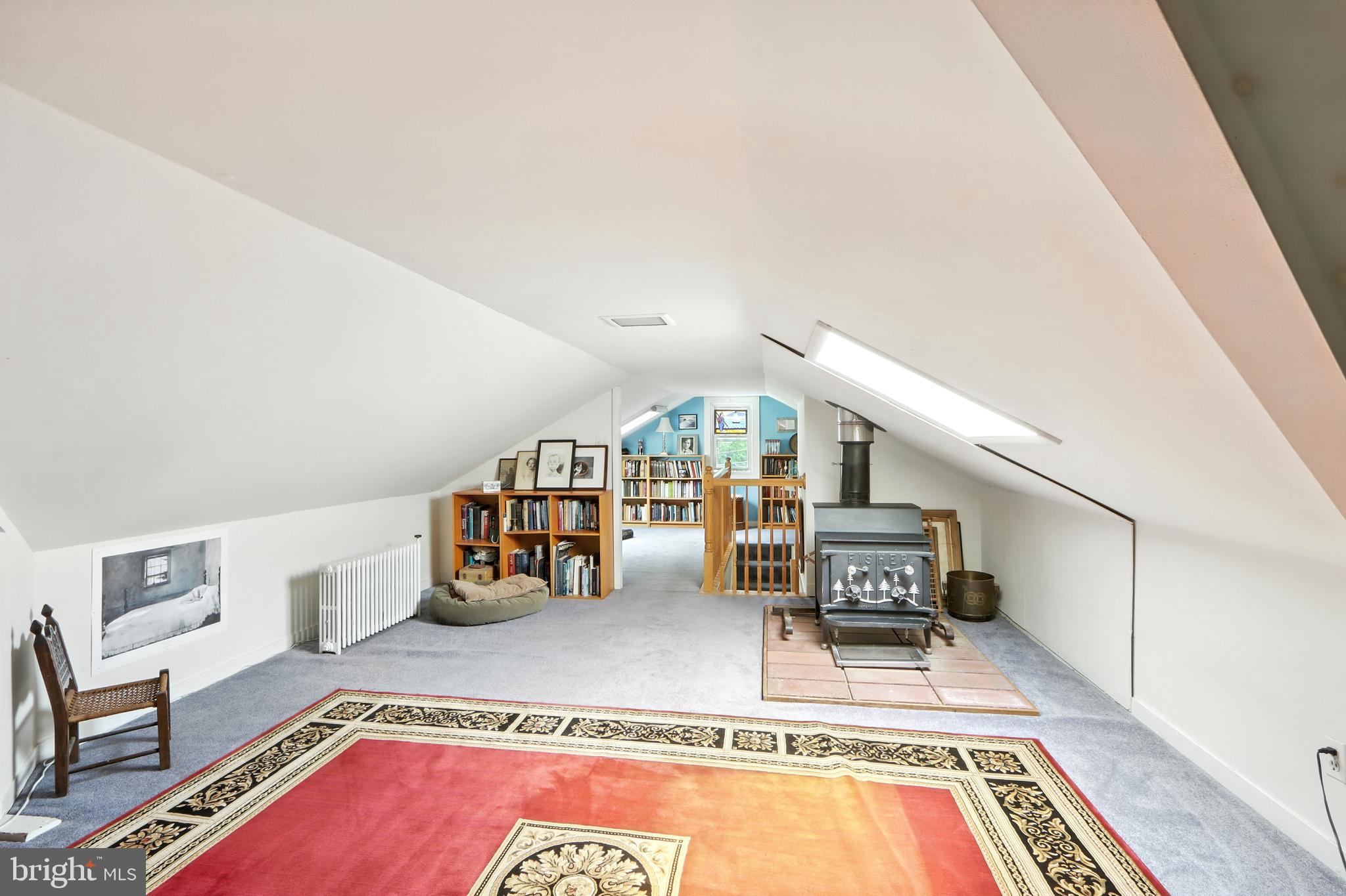 5721 Ridgedale Road Baltimore, MD 21209 - Photo 36 of 54 a living room with furniture and a table