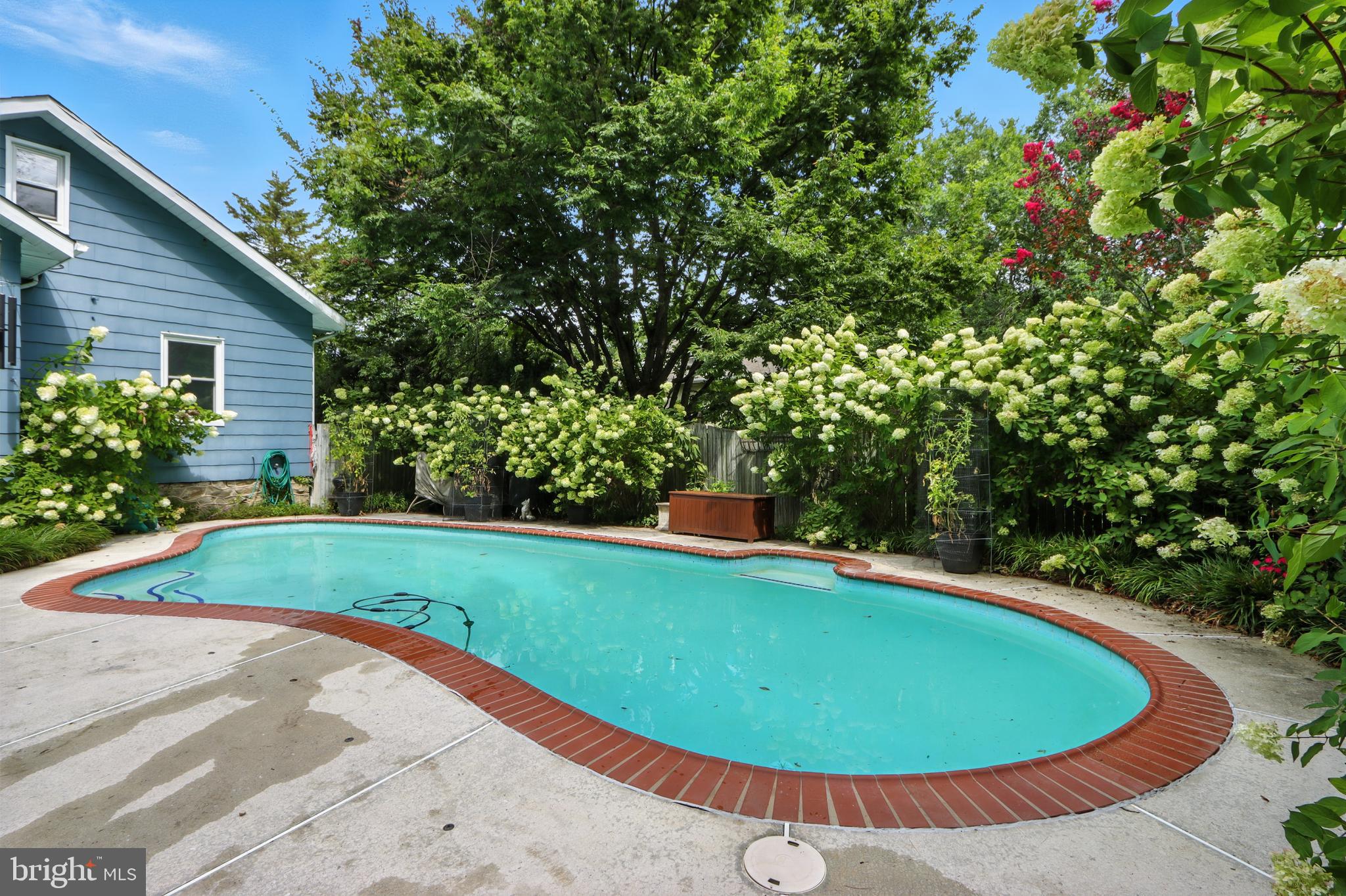 5721 Ridgedale Road Baltimore, MD 21209 - Photo 42 of 54 a view of a swimming pool with an outdoor space