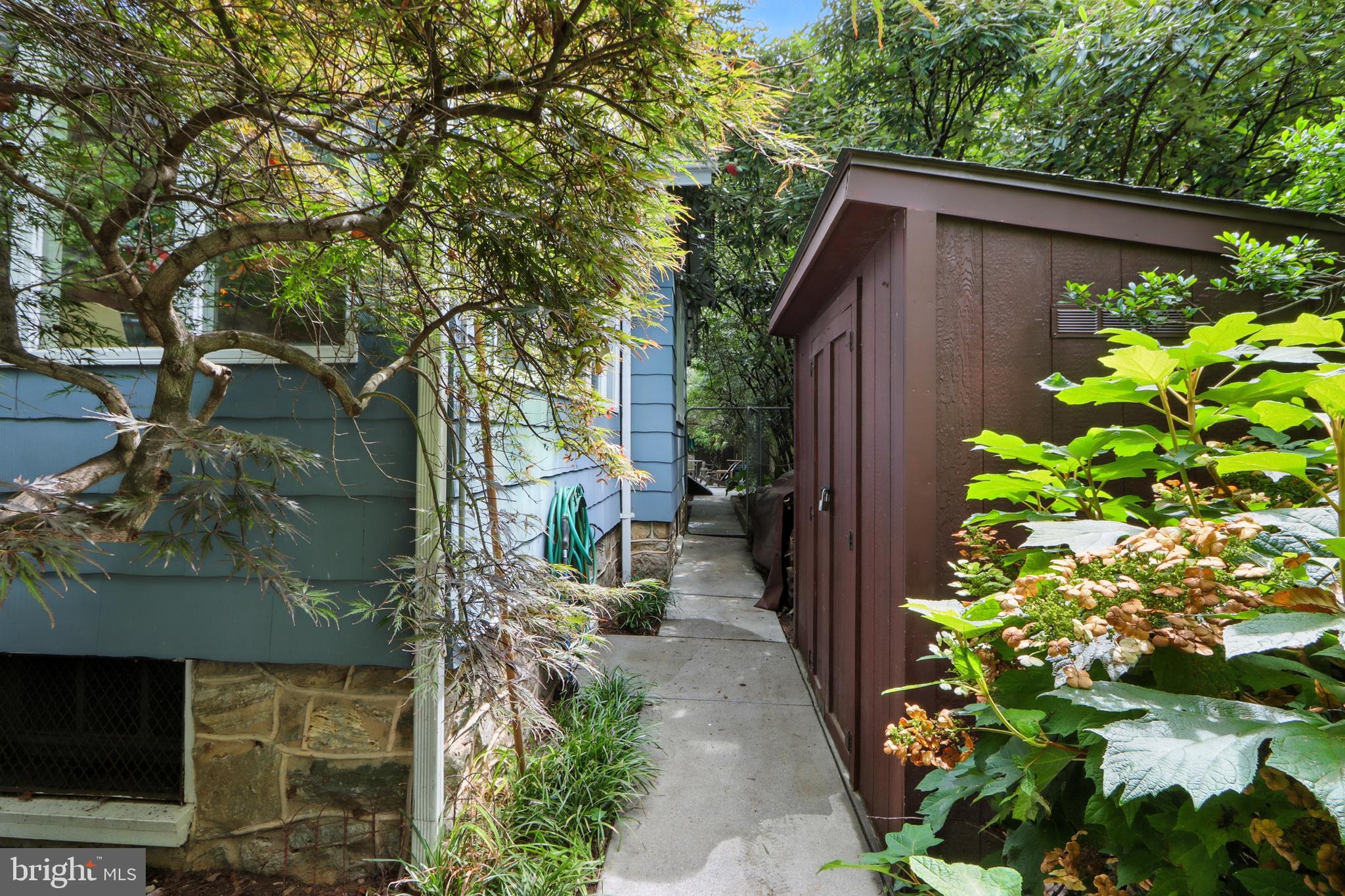 5721 Ridgedale Road Baltimore, MD 21209 - Photo 45 of 54 a backyard of a house with lots of green space