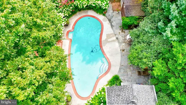 an aerial view of a swimming pool
