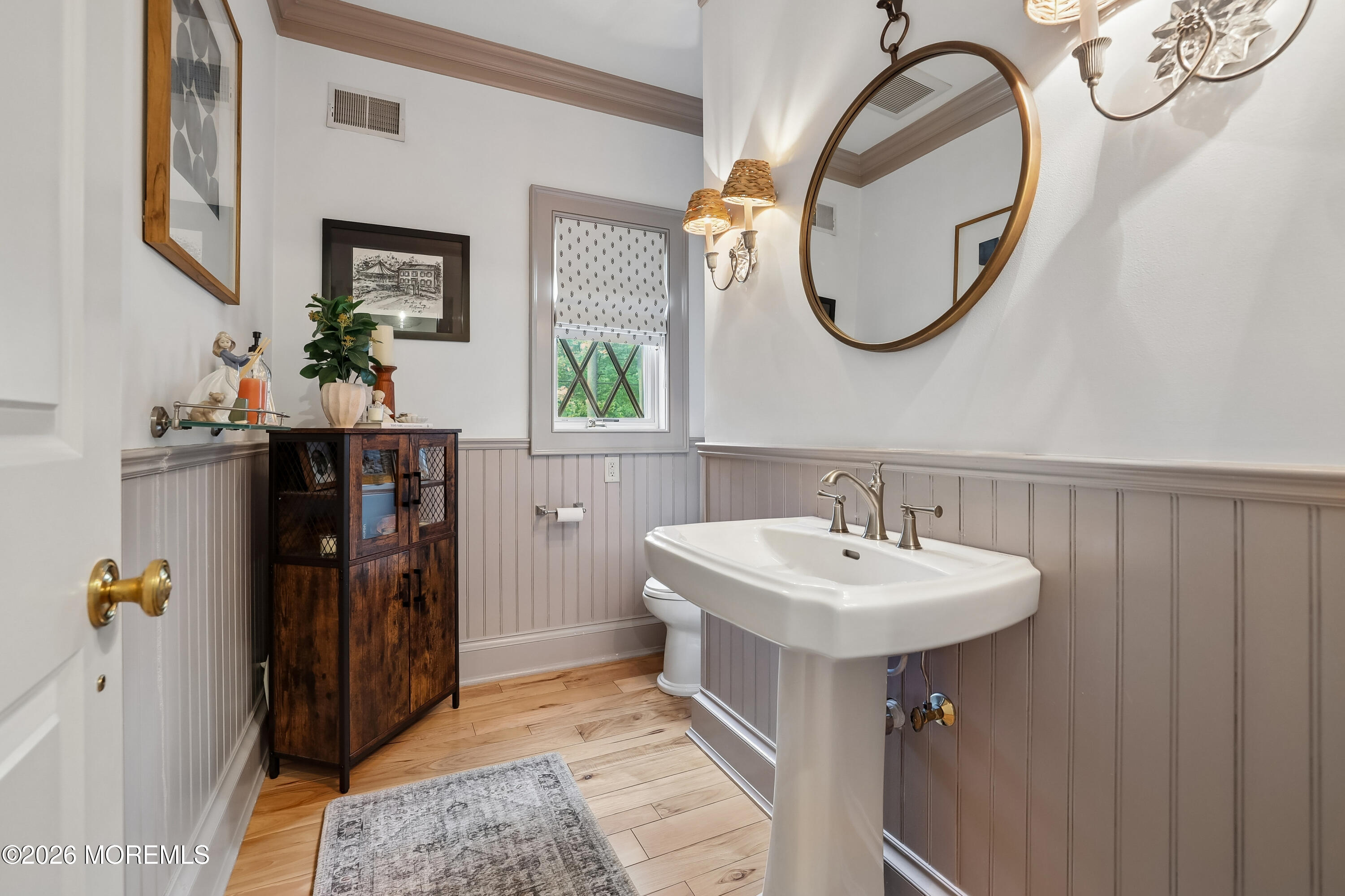 92 Tulip Lane Colts Neck, NJ 07722 - Photo 17 of 55 a bathroom with a sink and a mirror