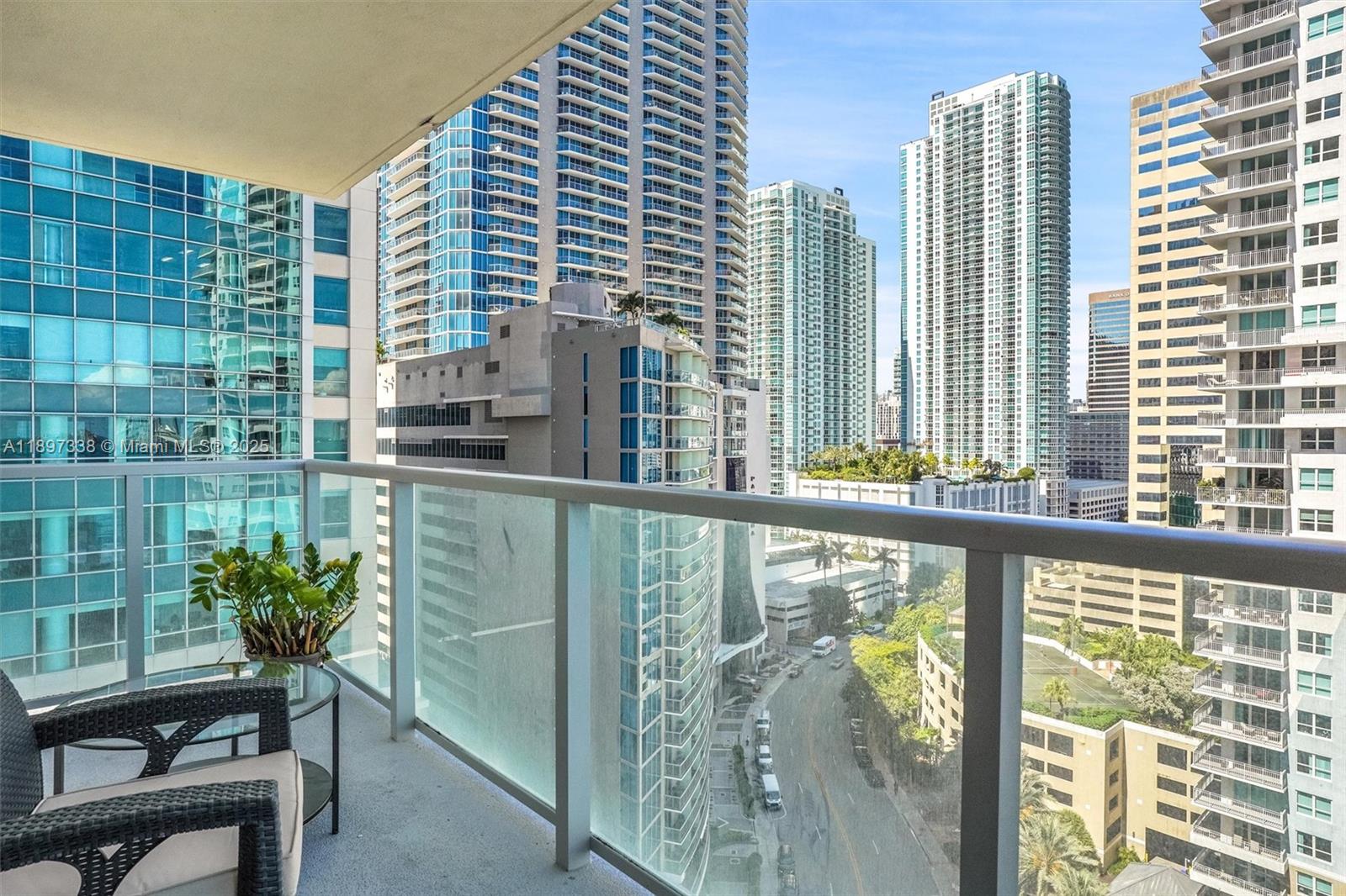 1155 Brickell Bay Drive, Unit 1702 Miami, FL 33131 - Photo 17 of 28 a view of a balcony with chairs