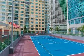 1155 Brickell Bay Drive, Unit 1702 Miami, FL 33131 - Photo 21 of 28 a view of a garden with tall buildings