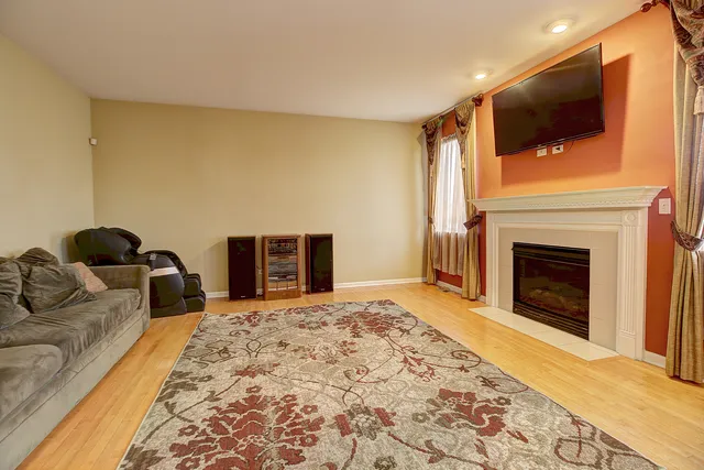 a living room with furniture and a rug
