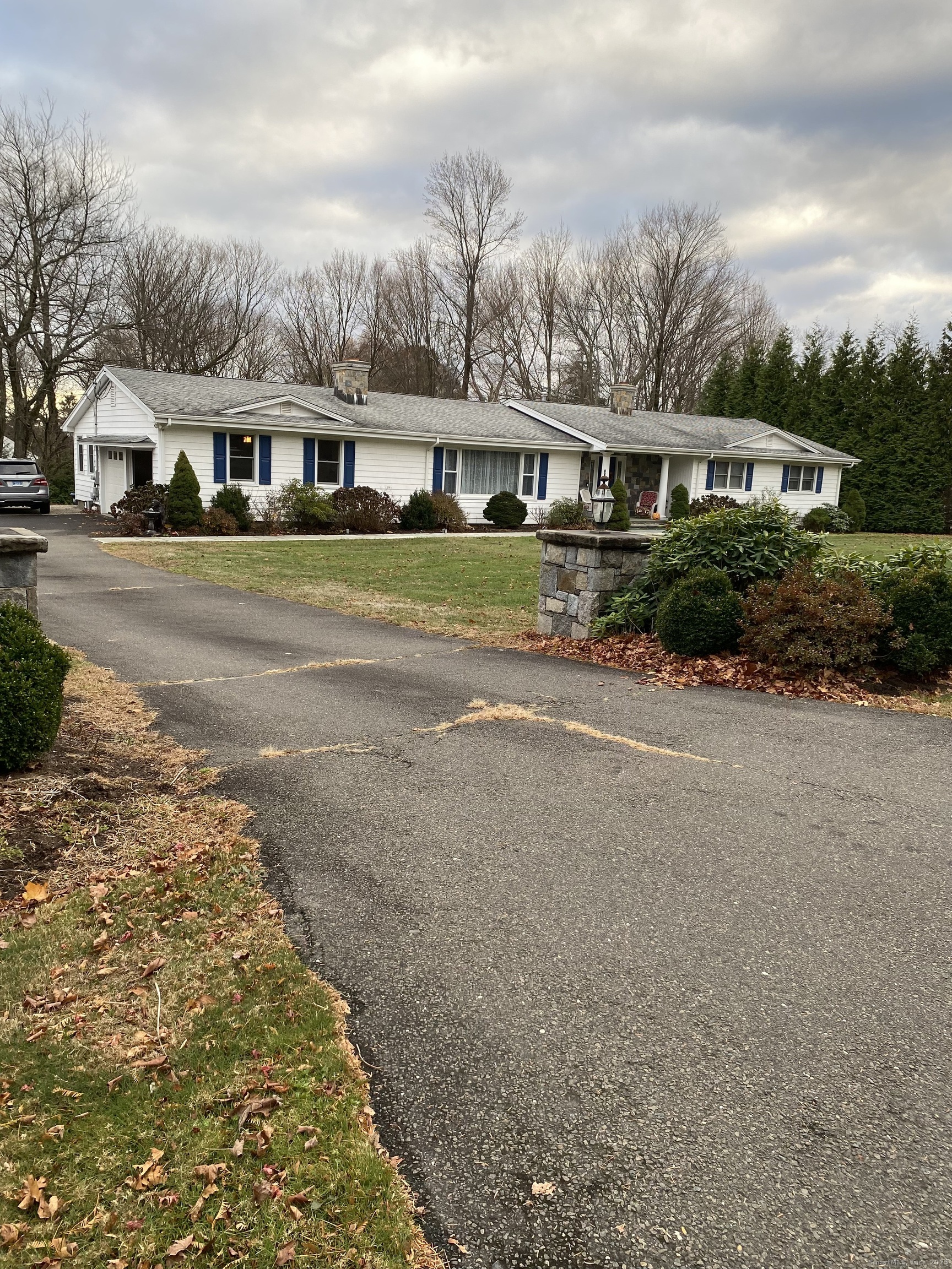 a front view of residential houses with yard