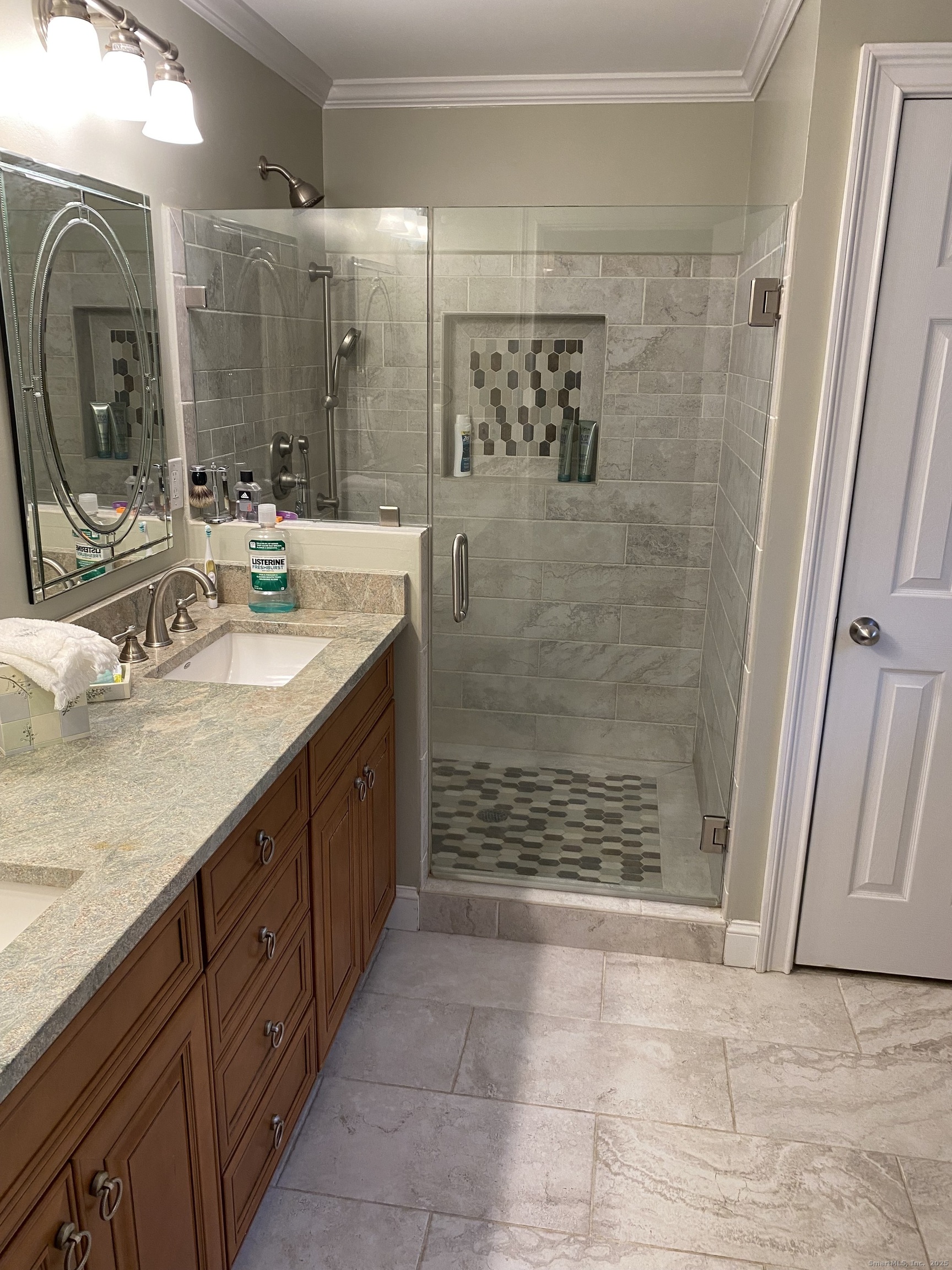 5 Meadow Wood Road Trumbull, CT 06611 - Photo 13 of 20 a bathroom with a granite countertop sink mirror and shower