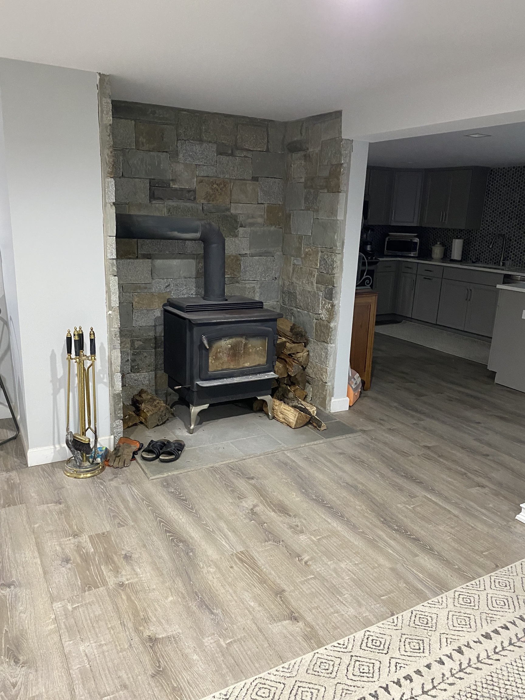 5 Meadow Wood Road Trumbull, CT 06611 - Photo 20 of 20 a living room with furniture and a fireplace