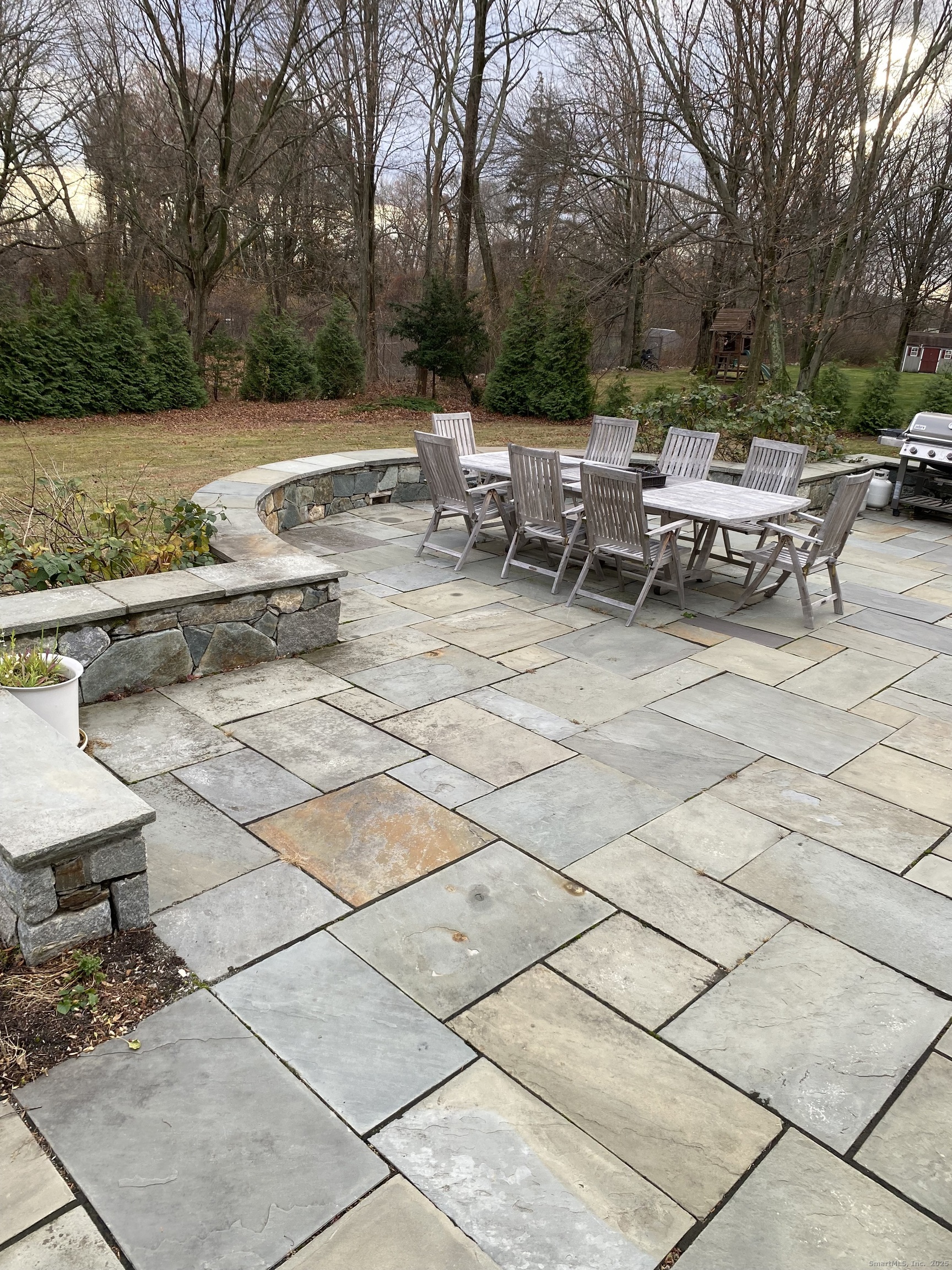 5 Meadow Wood Road Trumbull, CT 06611 - Photo 2 of 20 a view of backyard with seating space and trees