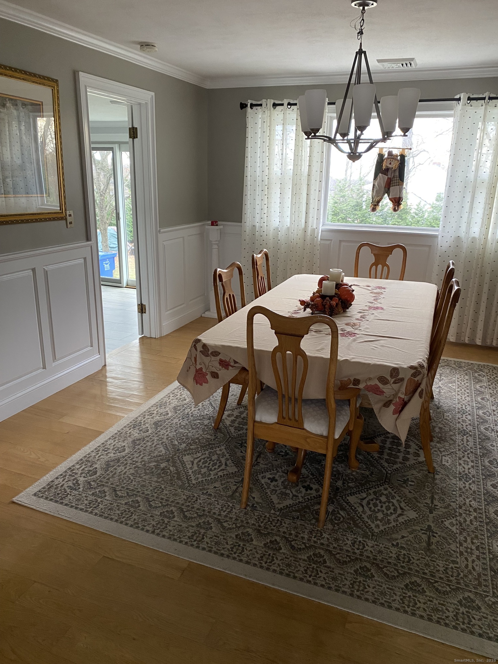 5 Meadow Wood Road Trumbull, CT 06611 - Photo 4 of 20 a view of a dining room with furniture window and wooden floor