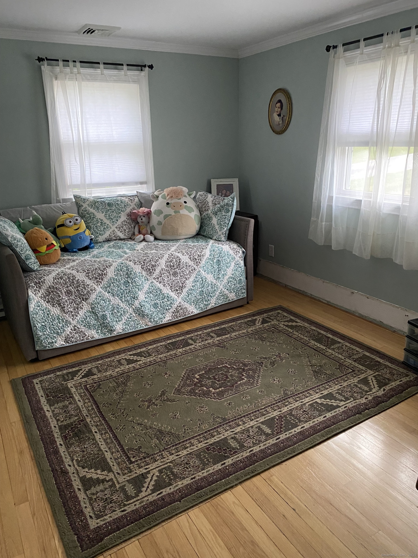 5 Meadow Wood Road Trumbull, CT 06611 - Photo 10 of 20 a room with wooden floor and two windows