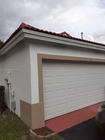 a view of a city street with cars