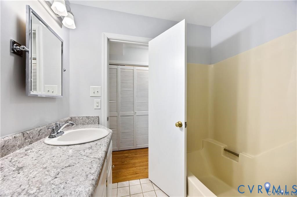 5062 Ruffin Road Prince George, VA 23875 - Photo 12 of 30 1st level hall bathroom has tub/shower enclosure,