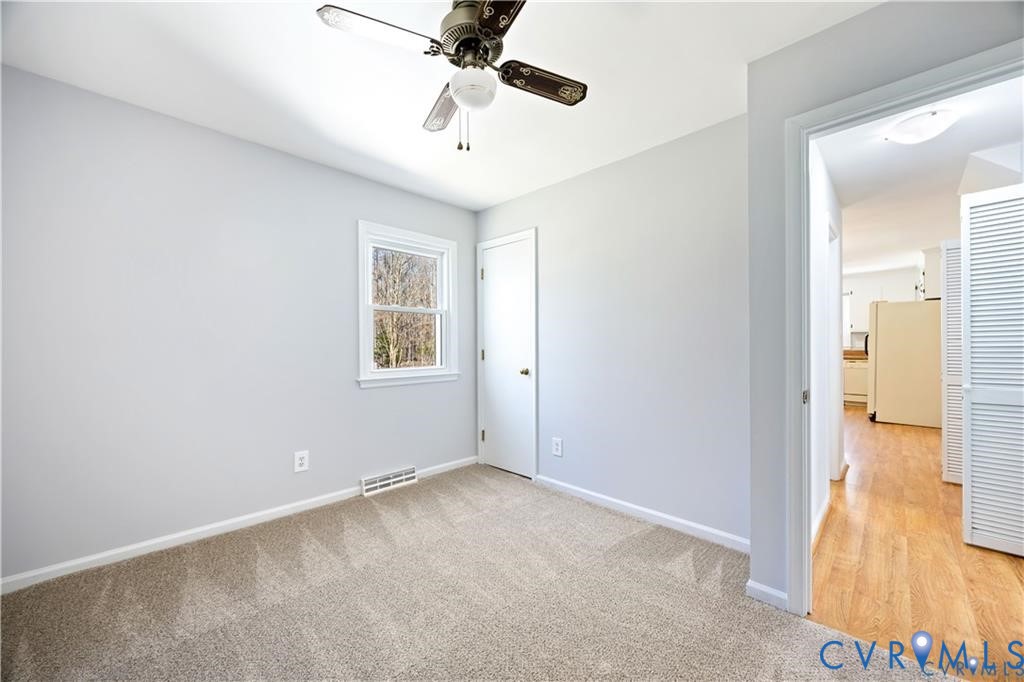 5062 Ruffin Road Prince George, VA 23875 - Photo 13 of 30 2nd bedroom on 1st level also has been freshly pai
