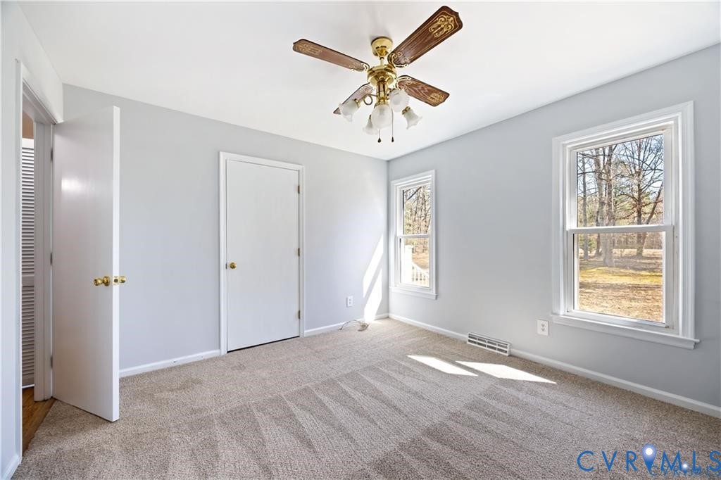 5062 Ruffin Road Prince George, VA 23875 - Photo 10 of 30 1 of 2 of the first level bedrooms. All 4 bedroom