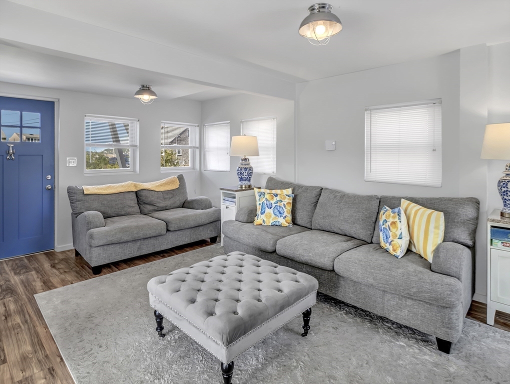 3 Bay View Street Hull, MA 02045 - Photo 14 of 39 a living room with furniture and a couch