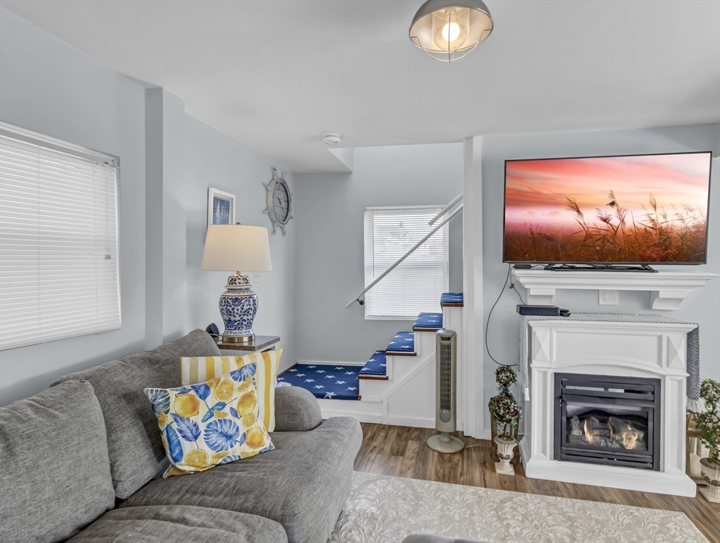 3 Bay View Street Hull, MA 02045 - Photo 16 of 39 a living room with furniture and a flat screen tv