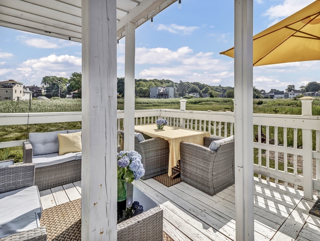 3 Bay View Street Hull, MA 02045 - Photo 18 of 39 a view of a balcony with couch