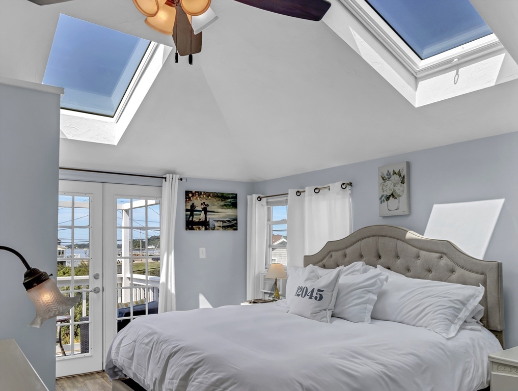 3 Bay View Street Hull, MA 02045 - Photo 25 of 39 a bedroom with a large bed and a window