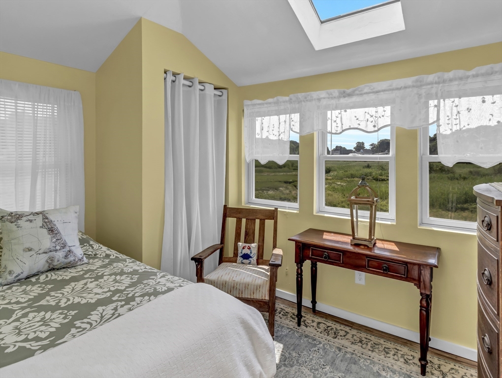 3 Bay View Street Hull, MA 02045 - Photo 32 of 39 a bedroom with a bed and a window