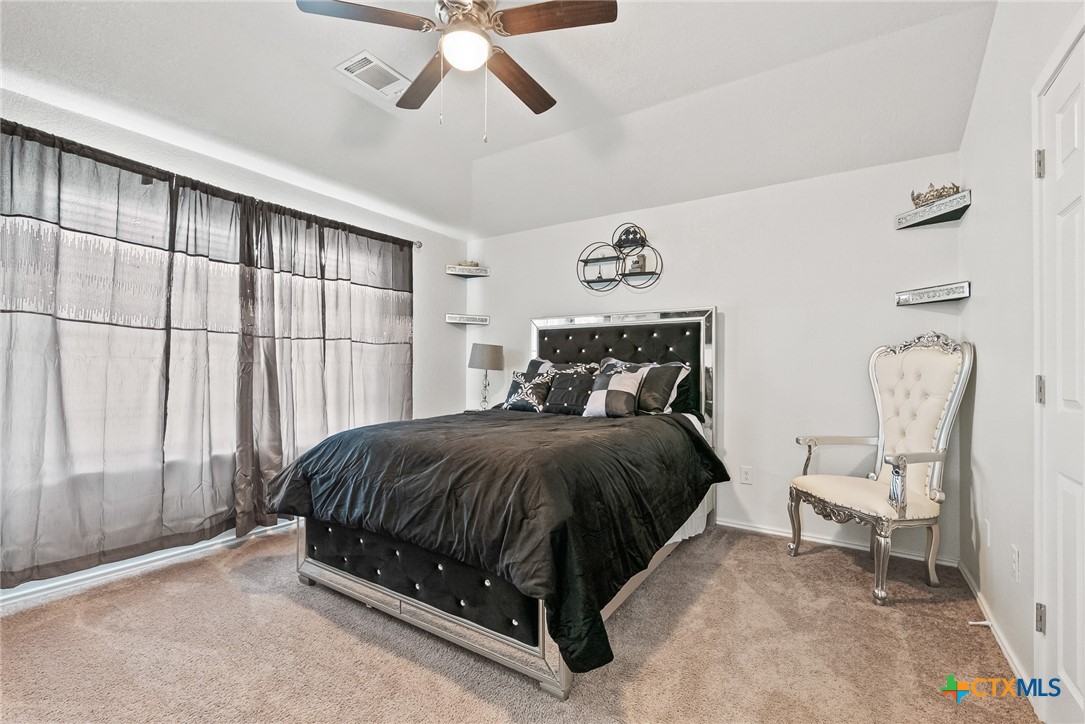 201 Danielle Drive Killeen, TX 76542 - Photo 13 of 16 a spacious bedroom with a bed and window