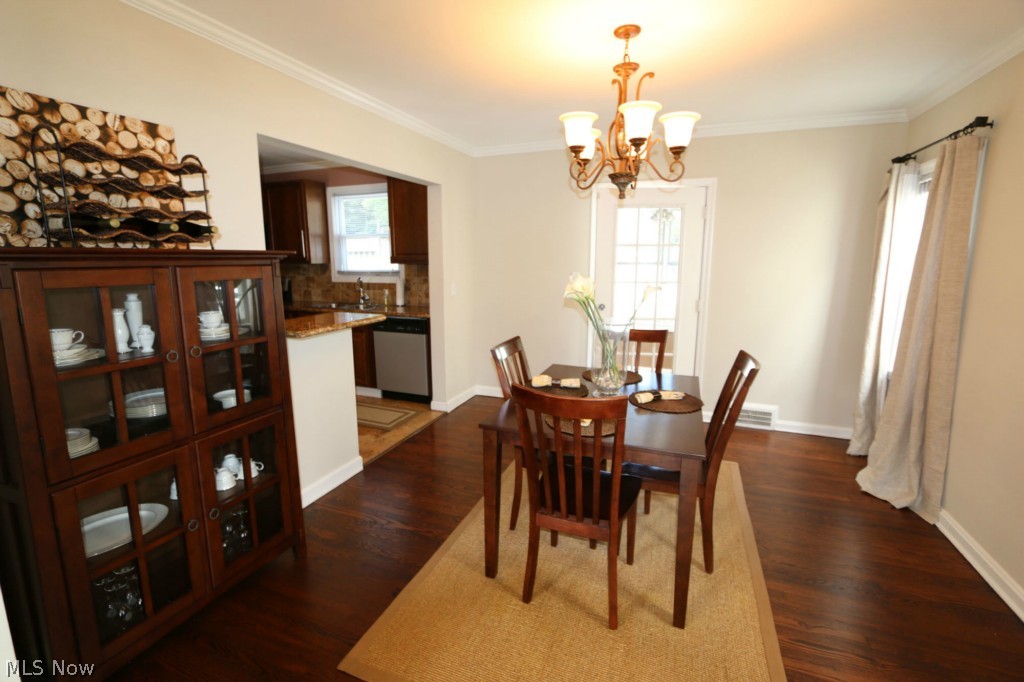 3666 Normandy Road Cleveland, OH 44120 - Photo 7 of 25 DINING ROOM LEADS TO 2 SEASON PORCH AND OPENS TO THE KITCHEN