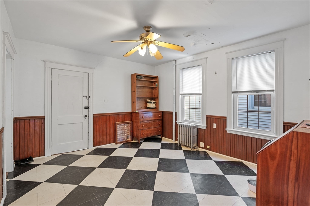 9 Glover Street, Unit 1 Salem, MA 01970 - Photo 11 of 34 a black and white checkered floor with a black white checkered floor next to a window