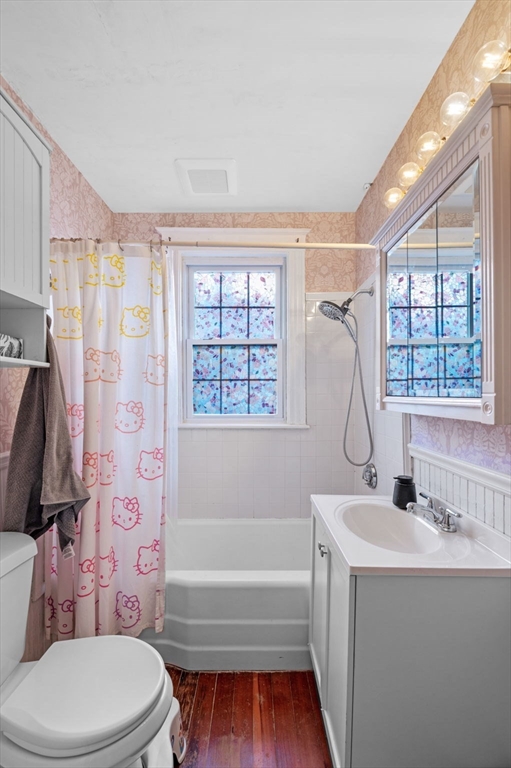 9 Glover Street, Unit 1 Salem, MA 01970 - Photo 23 of 34 a bathroom with a sink a toilet and a bathtub