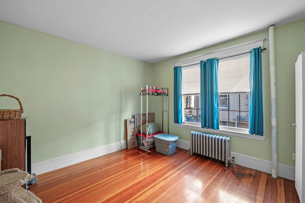 9 Glover Street, Unit 1 Salem, MA 01970 - Photo 27 of 34 a view of a room with furniture and windows