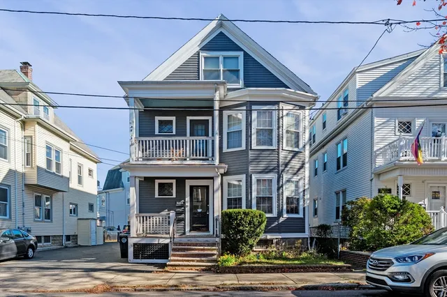 a front view of a building with garden