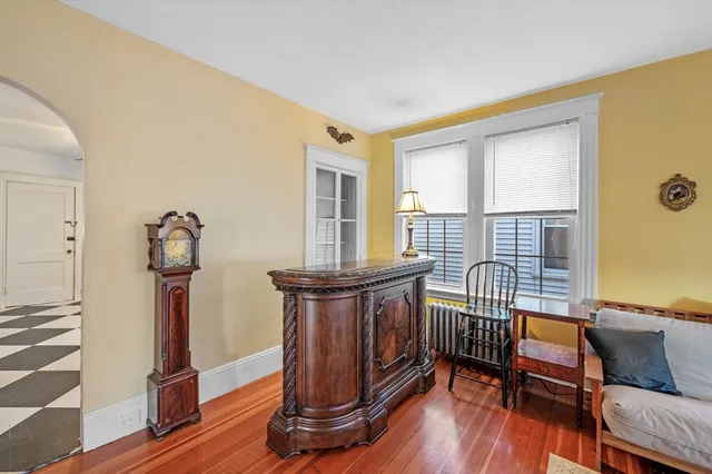 a view of a livingroom with furniture and wooden floor