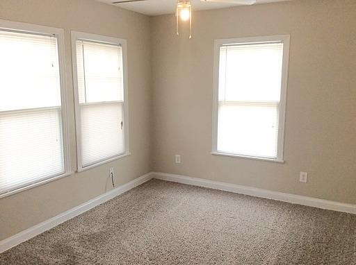 3405 24th Street Lubbock, TX 79410 - Photo 9 of 11 an empty room with a window