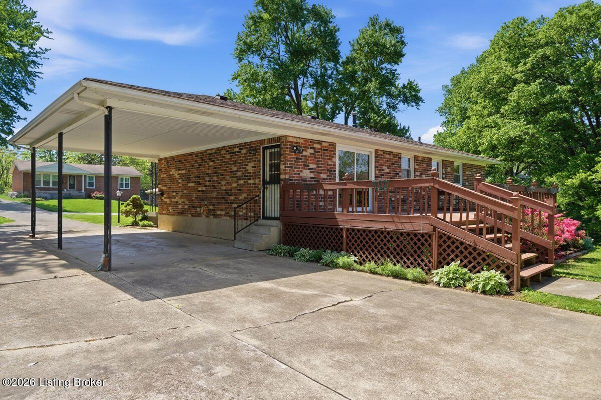 5503 Beth Road Louisville, KY 40219 - Photo 29 of 39 Carport and wide driveway