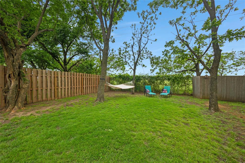 11061 Foutch Road Pilot Point, TX 76258 - Photo 31 of 37 The backyard offer you enough space to spread out. Imagine laying in a hammock, under the trees, on a warm summer weekend.