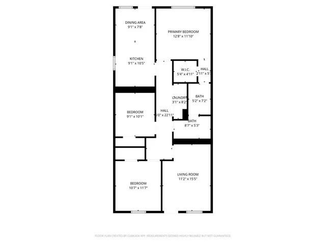 a picture of a bench in front of a wall