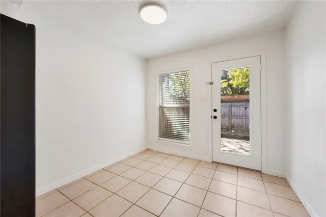 a view of an empty room with window