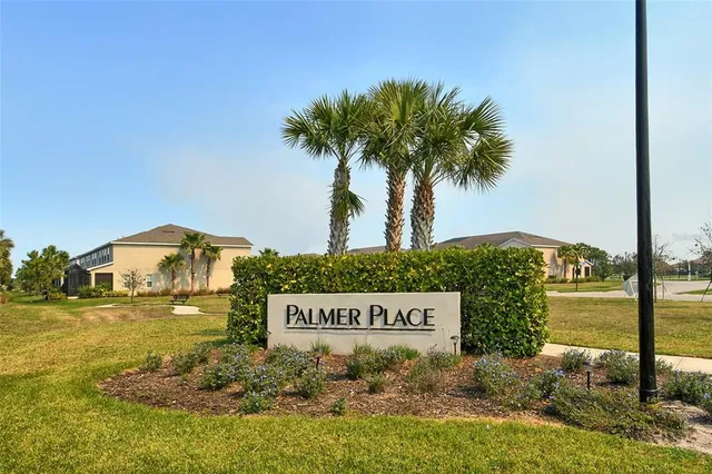 a view of a street with a building in the background