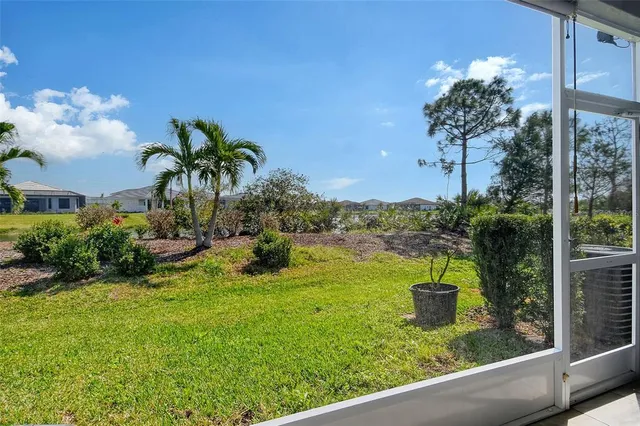 a view of a lake with a garden