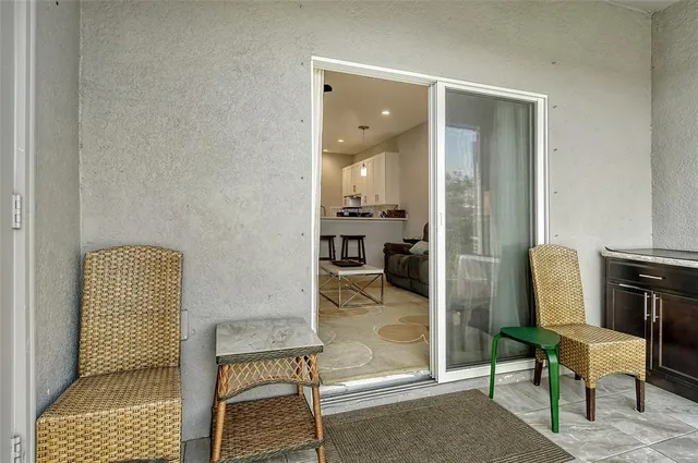 a room with furniture and a rug