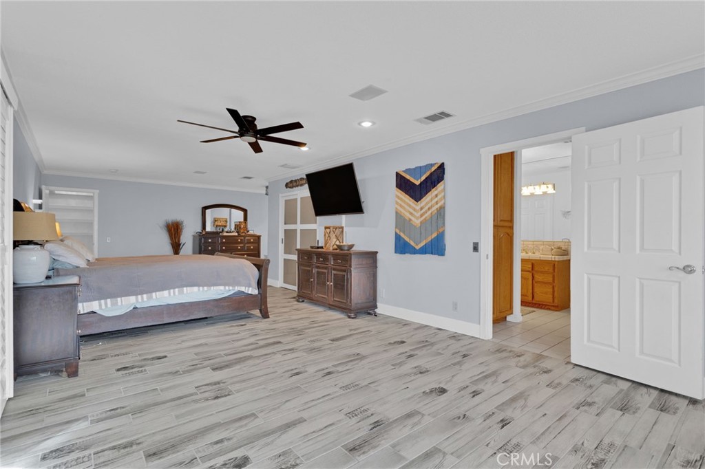 19655 Seneca Road Apple Valley, CA 92307 - Photo 23 of 67 a living room with furniture and a wooden floor