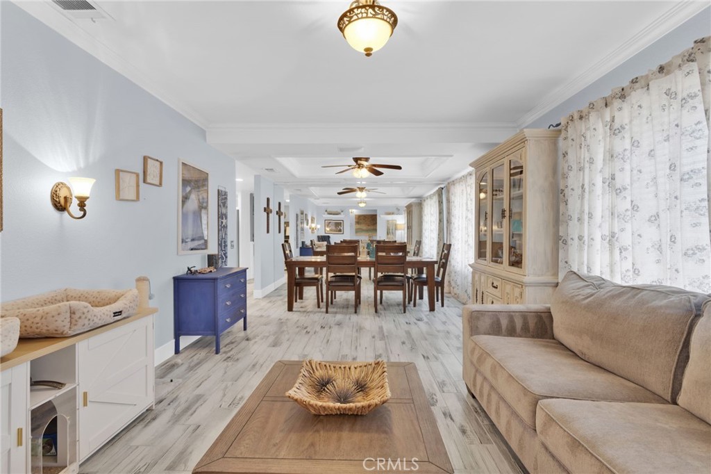 19655 Seneca Road Apple Valley, CA 92307 - Photo 29 of 67 a living room with furniture and wooden floor