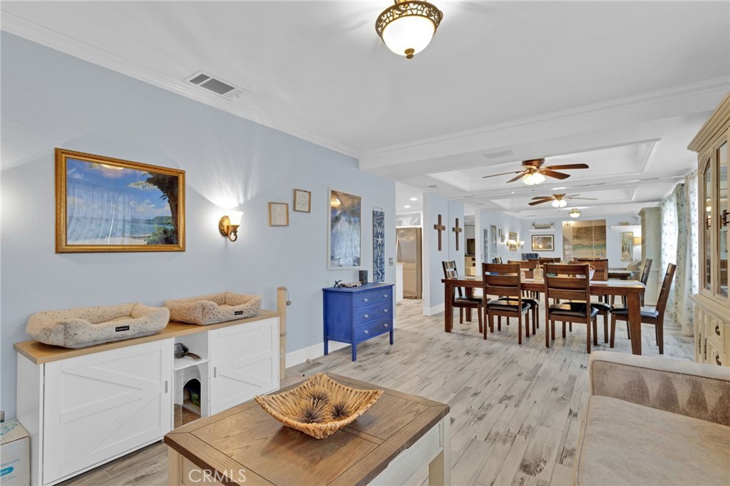 19655 Seneca Road Apple Valley, CA 92307 - Photo 31 of 67 a view of a dining room with furniture and chandelier