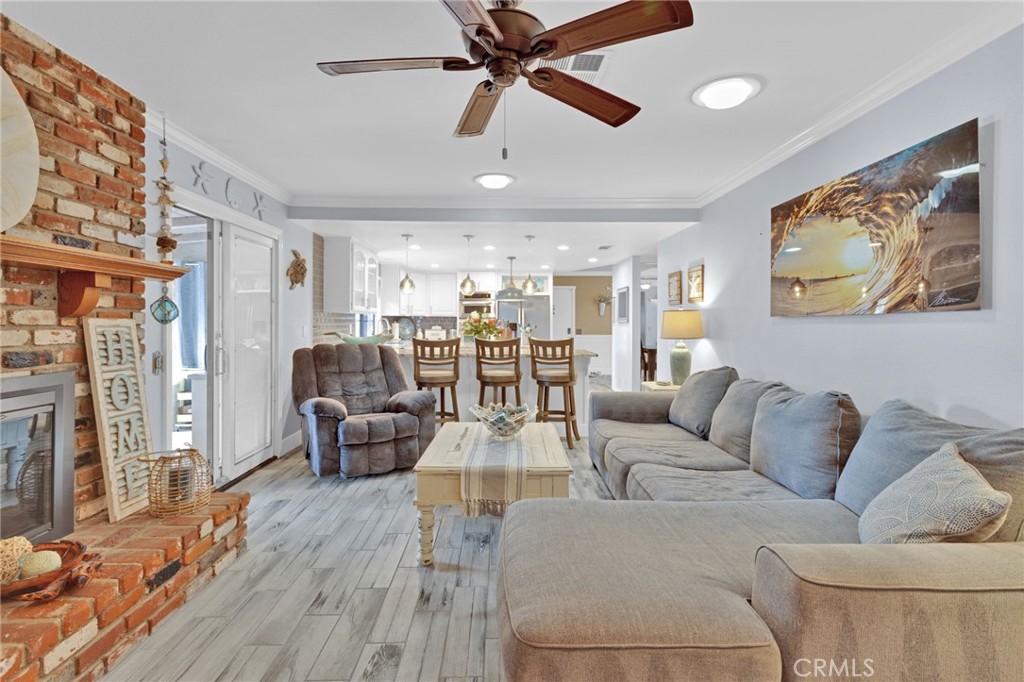 19655 Seneca Road Apple Valley, CA 92307 - Photo 36 of 67 a living room with furniture and a large window