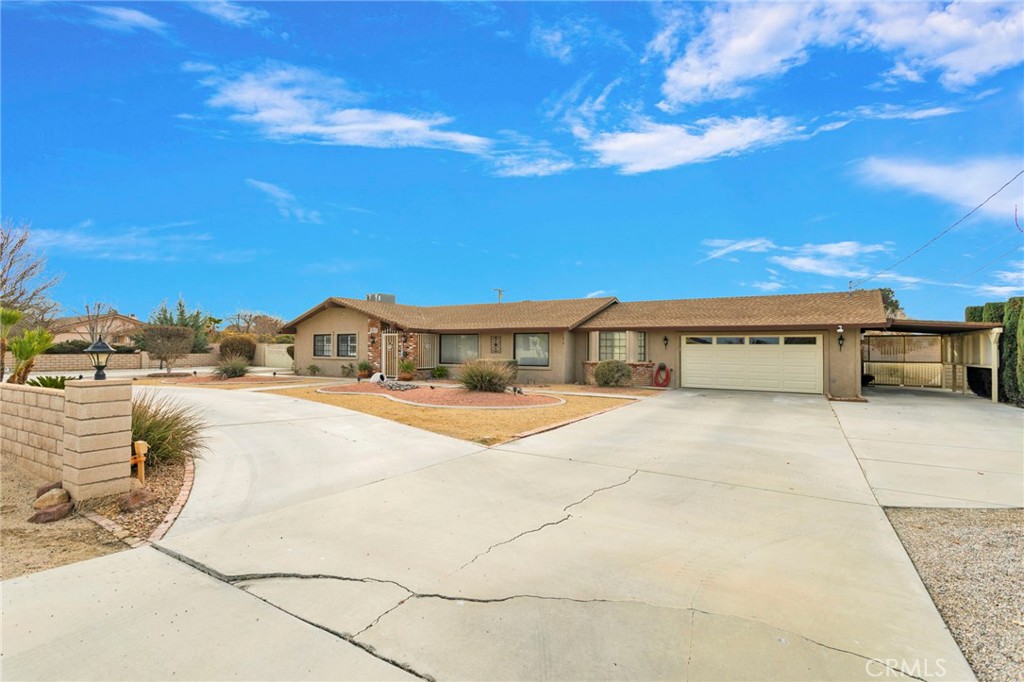 19655 Seneca Road Apple Valley, CA 92307 - Photo 4 of 67 a view of building with outdoor space