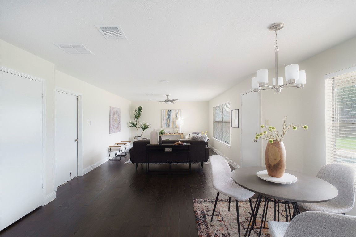 2201 Broughton Court Austin, TX 78727 - Photo 11 of 31 a living room with furniture a window and dining table
