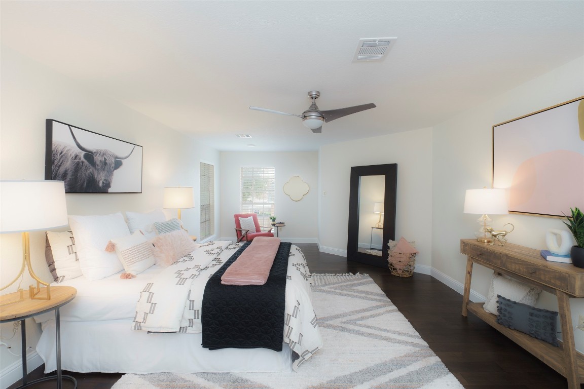 2201 Broughton Court Austin, TX 78727 - Photo 13 of 31 a living room with furniture and a lamp