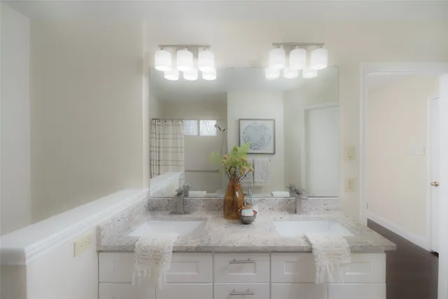 a close view of light fixtures and wooden floor